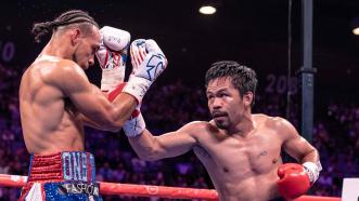 Pacquiao Decisions Thurman in a Thriller