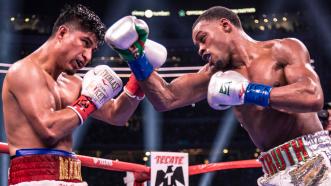 Spence Dominates Garcia, Retains Title via Unanimous Decision