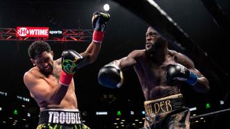 Wilder Flattens Breazeale in One, Retains World Title