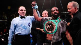 Russell Defeats a Game Nyambayar, Retains World Title